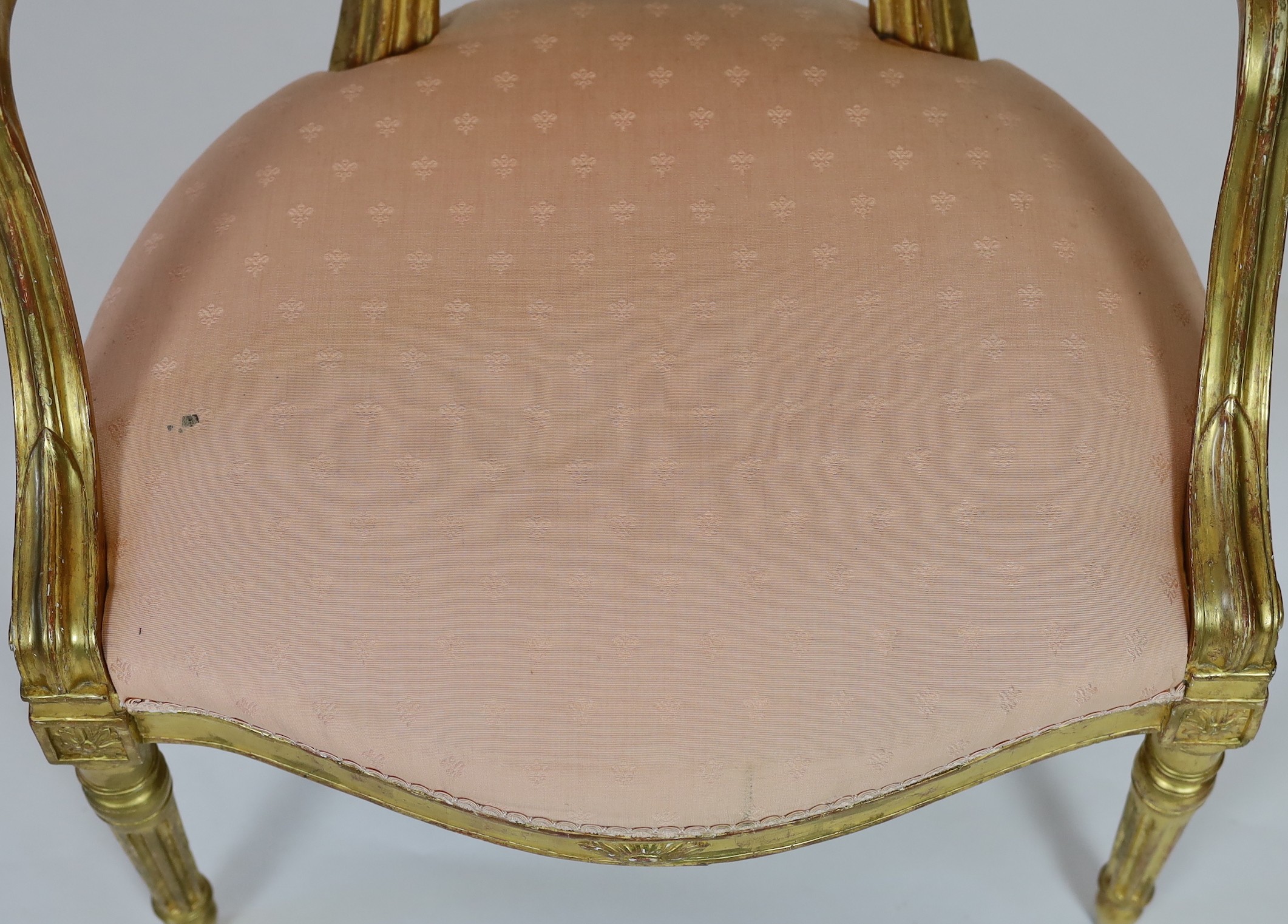 A George III Adam style giltwood armchair, width 61cm height 93cm